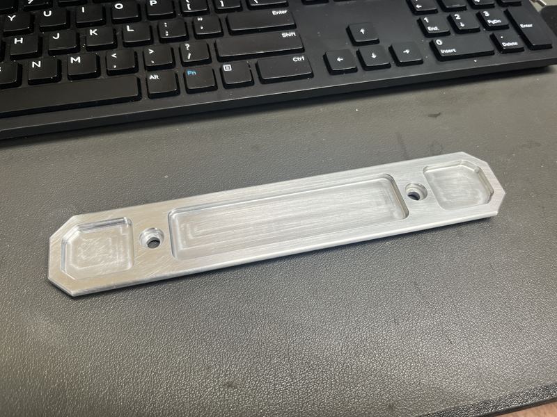 Long aluminum rail with a deep central pocket
